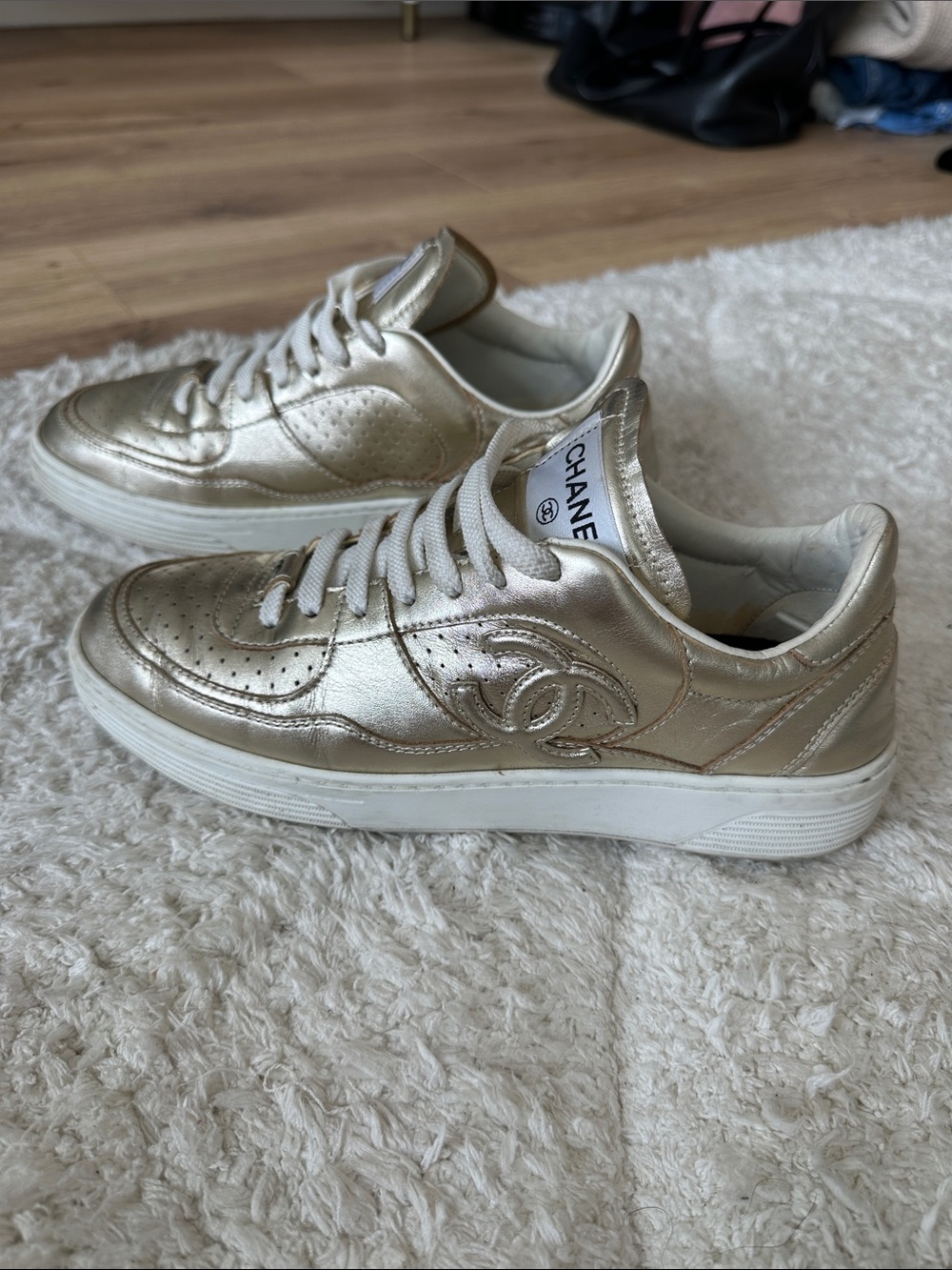 CHANEL Metallic Gold Low-Top Sneakers